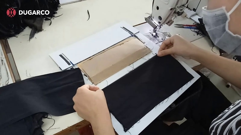 Laying and cutting fabric precisely to ensure consistency and reduce waste