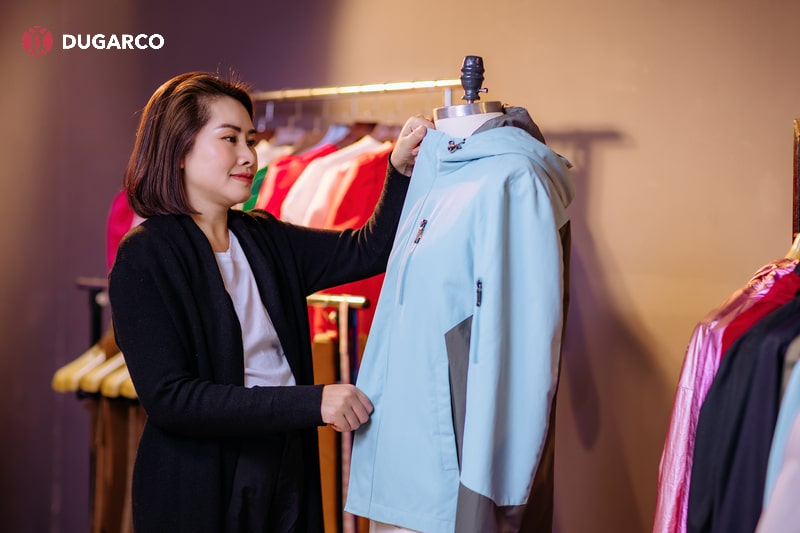 Inspecting garments for defects, sizing accuracy, and overall quality standards